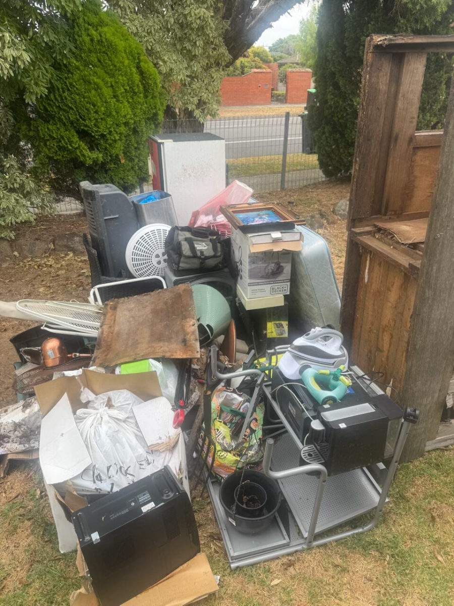 Yard full of household junk