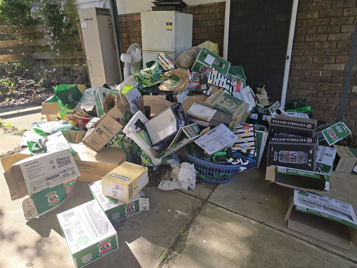 Boxes and rubbish piled outside
